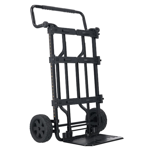 A black DEWALT folding hand trolley with large rugged wheels and a sturdy handle, designed for transporting heavy items. The frame features measurement markings and a foldable platform.