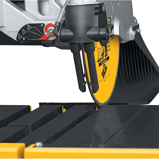 Close-up of DEWALT D24000 tile saw blade and cutting guides.