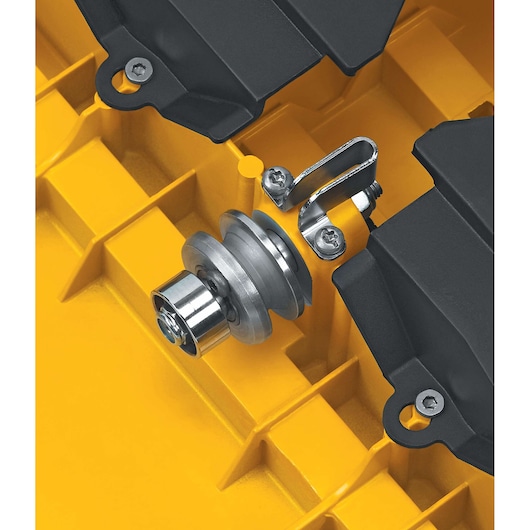 Close-up of a DEWALT D24000 metal part and fittings on a yellow grid background.