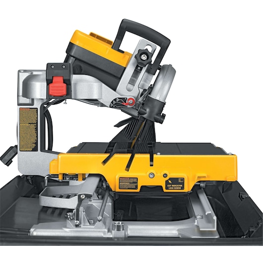 DEWALT D24000 tile saw with yellow and black parts, angled blade, and sturdy base for professional tile cutting.