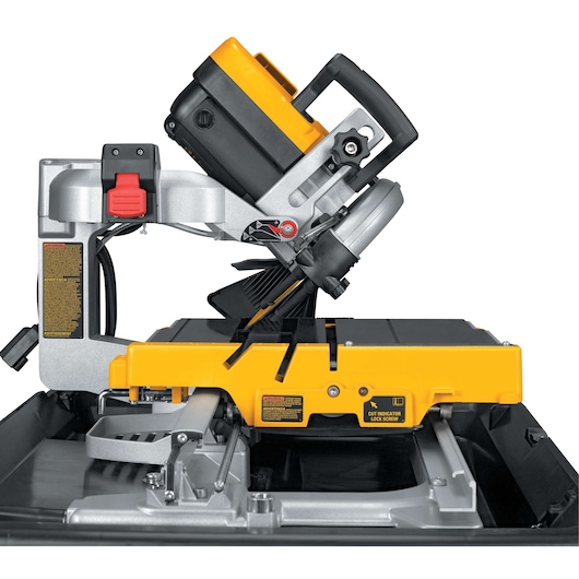 DEWALT D24000 tile saw with yellow and black design, side view showing cutting angle adjustment.