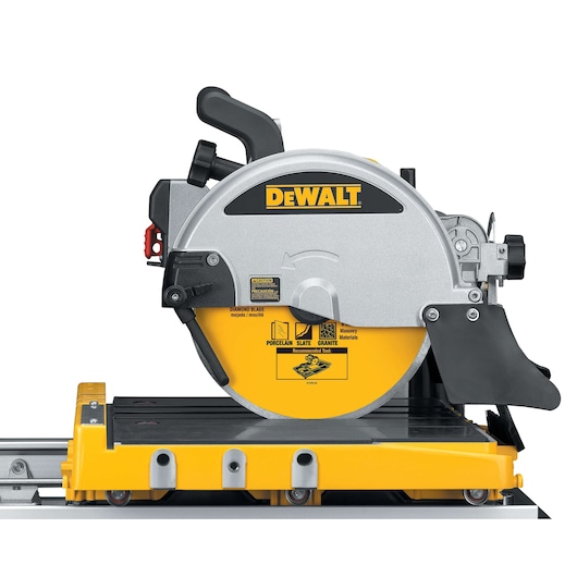Side view of a DEWALT D24000 tile saw with yellow base and circular blade, designed for cutting materials.