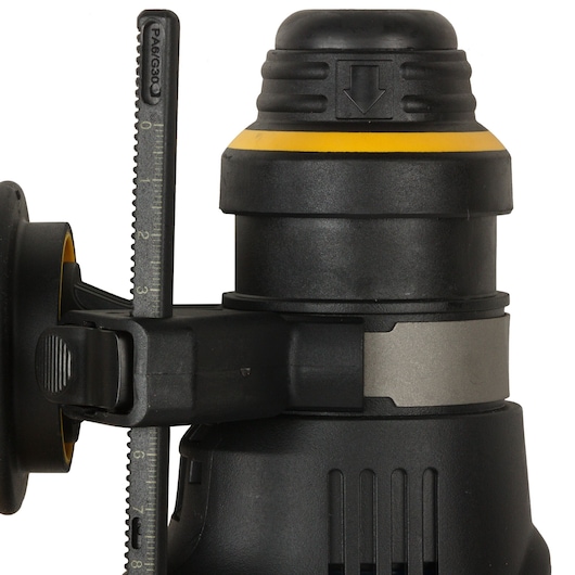 Close-up of a DEWALT D25333K power tool part in black and yellow, showing adjustment knob and scale.
