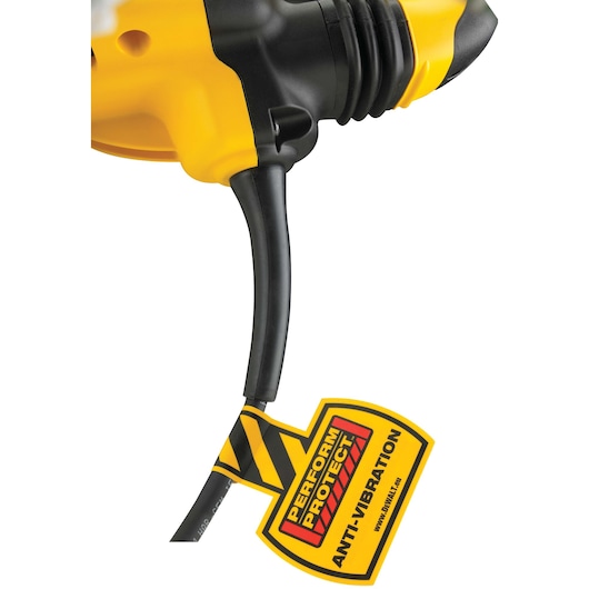 Close-up of a DEWALT tool cord with a yellow anti-vibration Perform Protect tag attached.
