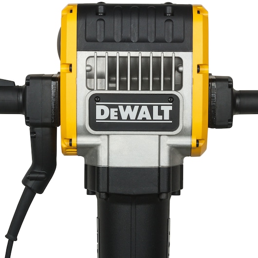Close-up of a DEWALT electric demolition hammer, showing its yellow and black handles and logo on the body.