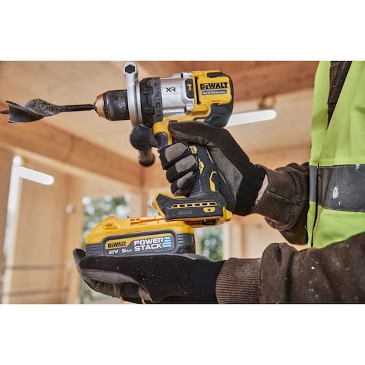 DEWALT drill shown at worksite. DCD1007NT and DCZ607X2-XE SKUs displayed in photography product category.