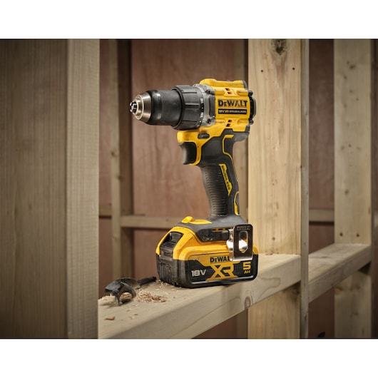 DEWALT cordless drill DCD794P2T, DCD794P2T-QW on wood. Product category: Photography.