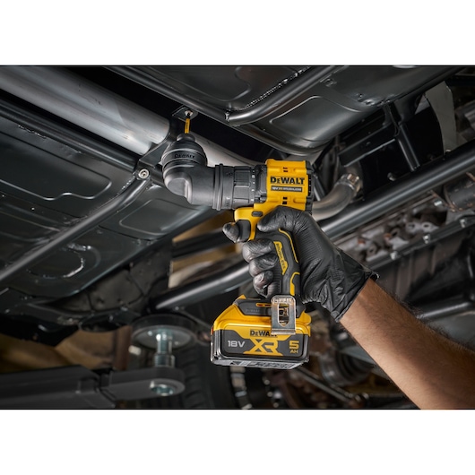 DEWALT drill DCD803P2T-QW and DCD803P2T used for automotive work in photography setting, shown held upright.