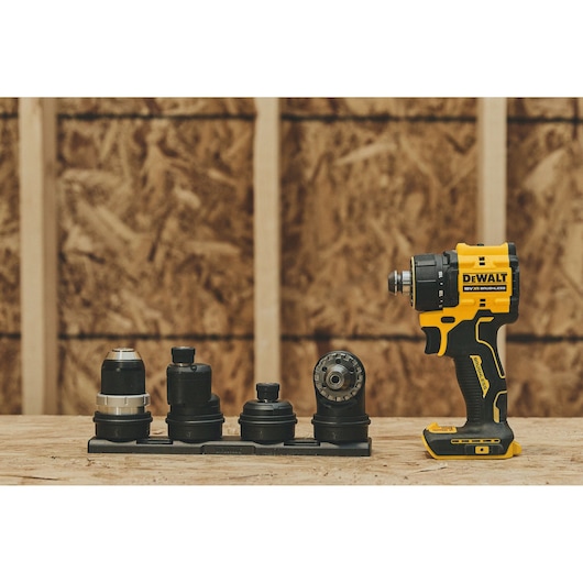 DEWALT drill with accessories, SKUs DCD803P2T-QW, DCD803P2T, in photography category on a wooden surface.