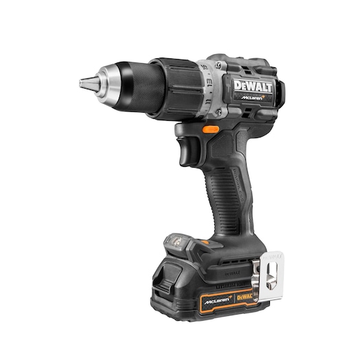 A DEWALT McLaren cordless drill with a black and silver design, featuring a textured grip, lithium-ion battery, and a belt clip. The drill is shown against a white background.