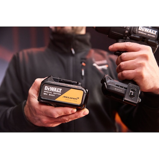DEWALT DCD86MP2T-QW, DCD86MP2T special edition battery shown in hand, product for photography category.