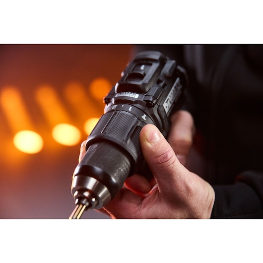 Hand holding DEWALT drill, Photography category, SKUs DCD86MP2T-QW, DCD86MP2T, close-up view.