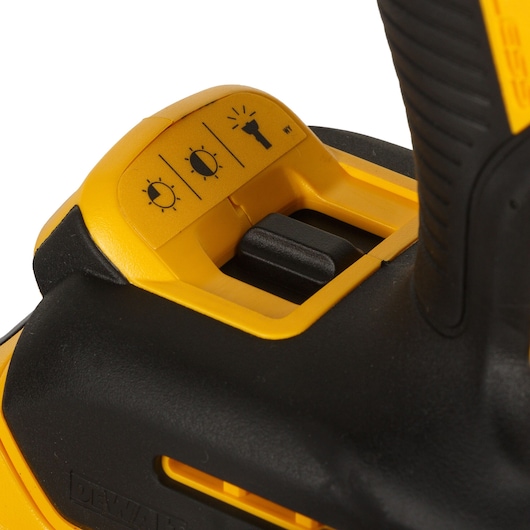 DEWALT DCD996P2, DCD996P2-QW lighting control switch detail on tool body. Photography category.