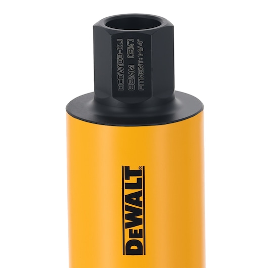 Close-up of a DEWALT yellow core drill bit with black shank and product details engraved on the top.
