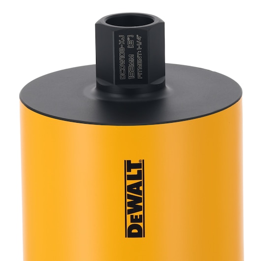 Close-up of a yellow DEWALT drill bit with a black top and DEWALT logo printed on the side.