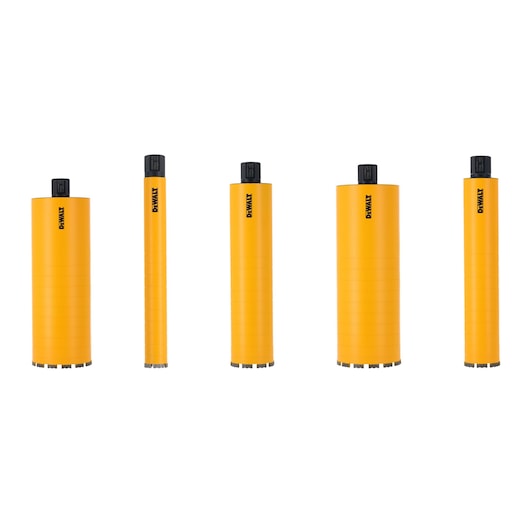 Five yellow DEWALT core drill bits of varying sizes, upright on a white background.