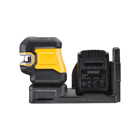 DEWALT yellow and black laser level with battery and charger on a base, used for precise measurements.