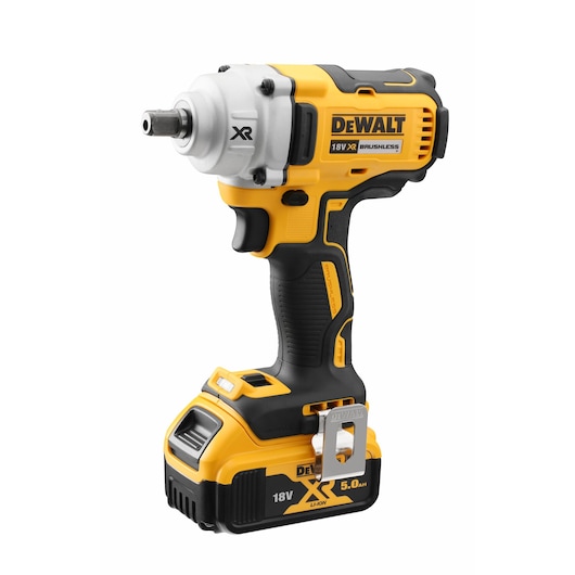 DeWalt 18V XR cordless impact wrench with brushless motor and 5.0Ah battery. Yellow and black design.