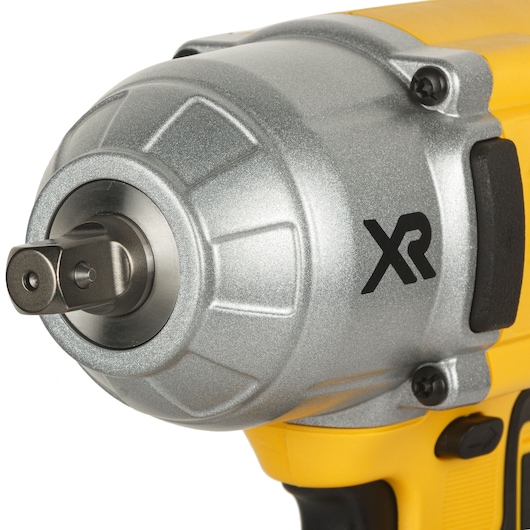 Close-up of a DEWALT XR cordless impact wrench in yellow and silver.