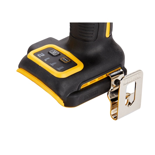 Close-up of the base of a DEWALT cordless power tool, showing control buttons, a yellow and black handle, and a metallic belt clip.