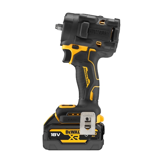 A DEWALT 18V XR cordless impact wrench with brushless motor, featuring black and yellow design and a metal belt clip, standing upright on a white background.
