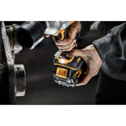 DEWALT power tool in use, close-up. Photography, SKUs: DCF961N, DCF961N-XJ.