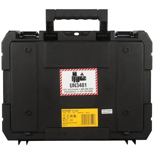 Black DEWALT tool case with UN3481 battery warning label and yellow product information sticker.