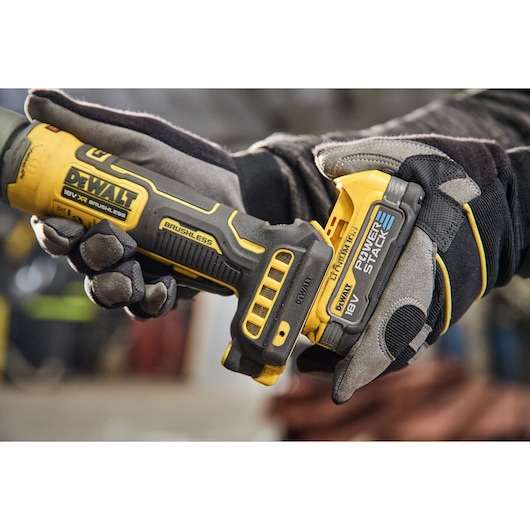 DEWALT DCG420N-XJ, DCG420N brushless tool held by gloved hands. Photography category.