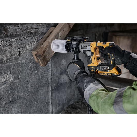 DEWALT tools DCH172NT-XJ, DCH172NT in use by worker drilling wood and concrete. Photography category.