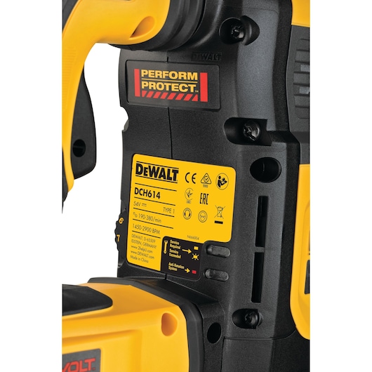 Close-up of DEWALT DCH614 power tool label and Perform Protect sticker, showing model details and specifications.