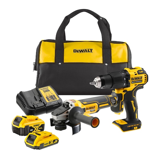 DEWALT tool kit with bag, drill, grinder, charger, and two 18V batteries, all in yellow and black.