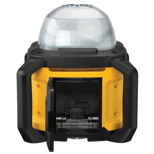 DEWALT portable work light with a clear dome top and open battery compartment, seen from the front.