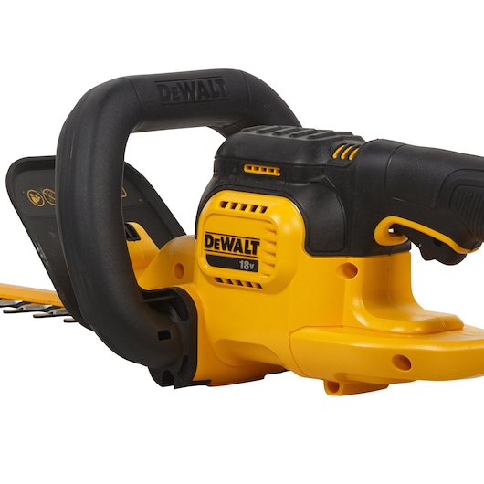 Close-up of a DEWALT 18V cordless hedge trimmer handle with yellow and black design.