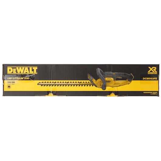 DEWALT DCM563PB hedge trimmer box features yellow and black branding and 18V lithium ion details.