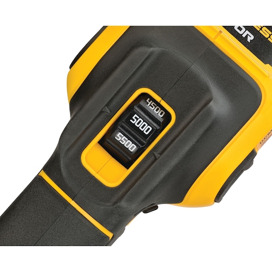 Close-up of a DEWALT tool showing a speed selector switch with three options labeled 4500, 5000, and 5500 against a black and yellow casing.