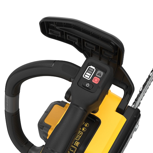 Close-up of DEWALT chainsaw handle and control buttons in black and yellow.