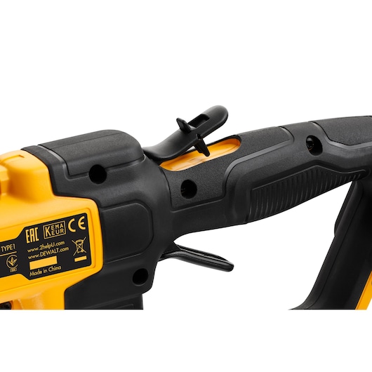 Close-up of DEWALT cordless power tool handle with yellow and black design, showing labels and controls.