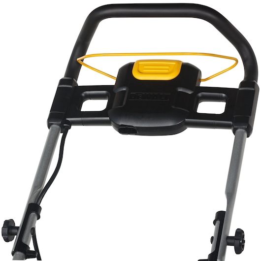 Close-up of a DEWALT lawn mower handle with yellow and black detailing, showing control panel and bars.