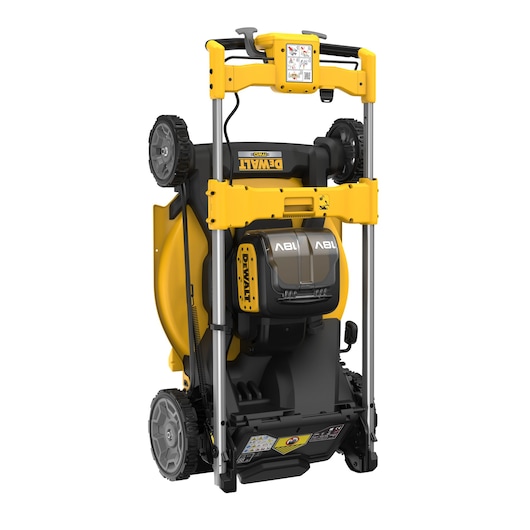 Yellow DEWALT lawn mower shown upright for storage, featuring dual battery compartments and sturdy wheels.