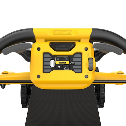 Close-up of DEWALT DCMWSP156N lawn mower control panel with yellow and black handles and display icons.