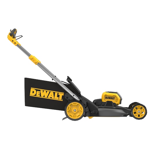 Side view of a DEWALT cordless lawn mower with yellow and black design and grass collection bag.