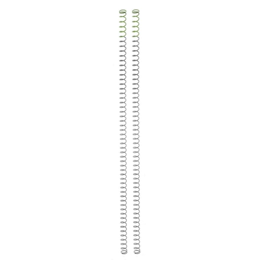 Two long metal springs positioned vertically on a plain white background.