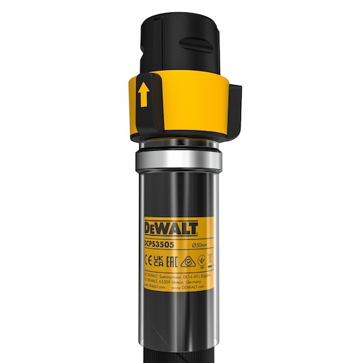 Close-up of DEWALT DCPS3505 tool handle with yellow details and product label visible on metal surface.