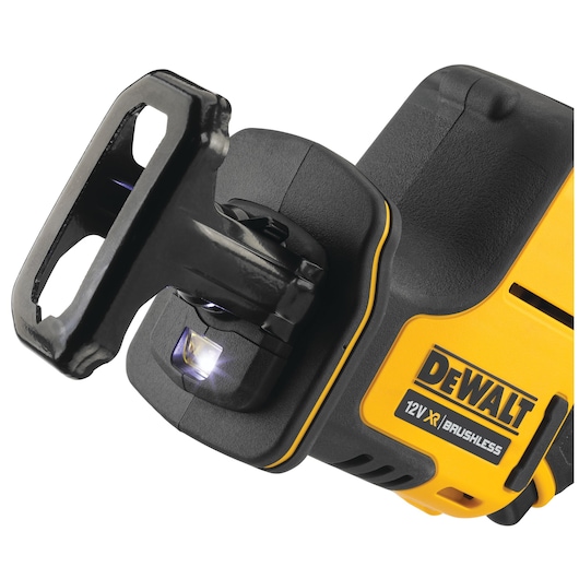 Close-up of a DEWALT 12V XR brushless power tool showing its blade holder and LED light.