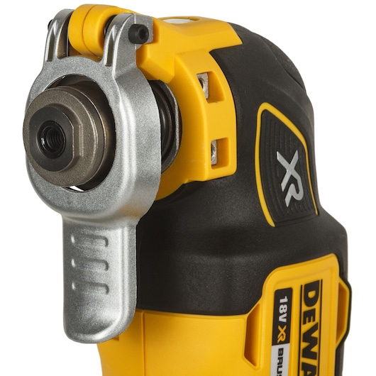 Close-up of a DEWALT DCS355D2 18V XR oscillating multi-tool in yellow and black with metal attachment.