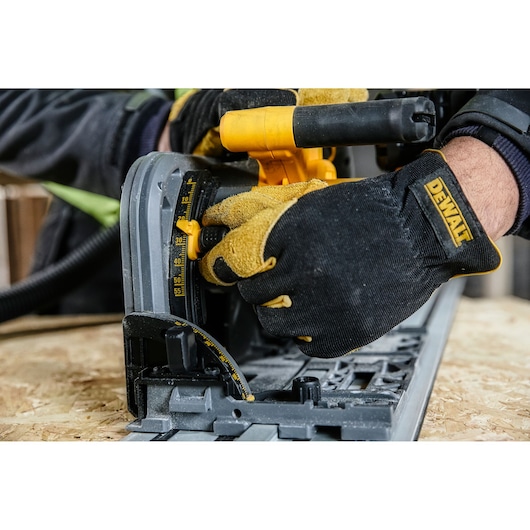 DEWALT gloves adjust saw, close-up. Products: DCS520T2-XE, DCS520T2. Photography category.