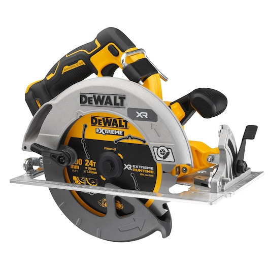 A DEWALT cordless circular saw with a brushless motor, featuring a yellow and black handle, silver blade guard, and marked blade with 'XR Extreme Runtime' labeling. The saw is positioned on a metal base.