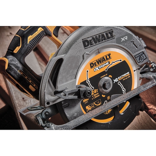 Close-up of a DEWALT DCS573NT cordless circular saw with brushless motor and Extreme Runtime blade.
