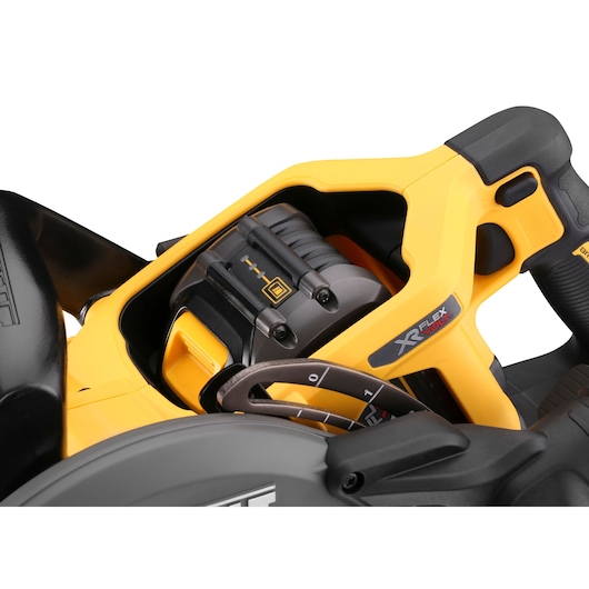 Close-up of a yellow DEWALT XR FlexVolt power tool with visible adjustment dial and handle.