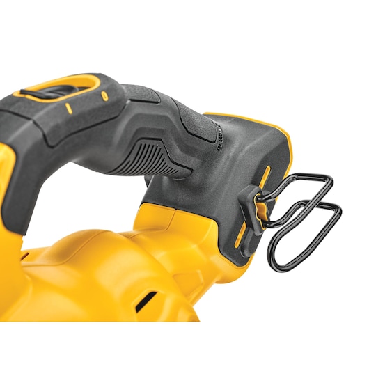 Close-up view of the handle and hook attachment of a DEWALT power tool, in yellow and black colors.